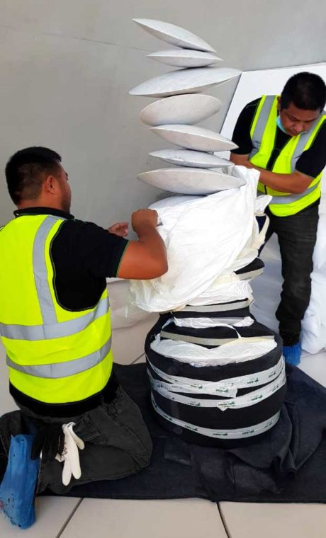 Bovis Fine Art team installing a sculpture in Sharjah, UAE